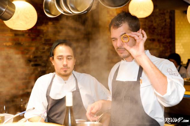 (R-L) Chef Rubén García prepares a special 'Ferrero Rocher' bite with Chef Diego Caro.